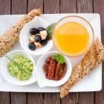 breakfast, orange juice, loaf, whole wheat, whole grain bread, guacamole, nourishment, yummy, meal, breakfast table, have breakfast, plate, healthy, tasty, food, vitamins, in the morning, breakfast, breakfast, breakfast, breakfast, breakfast, food